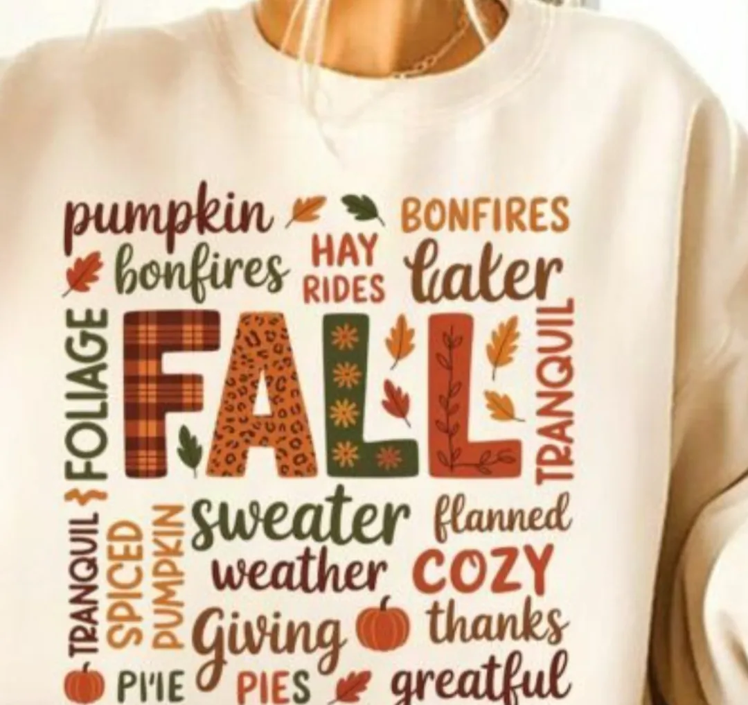 Fall sweater with pumpkin, bonfires, and giving thanks on the front.